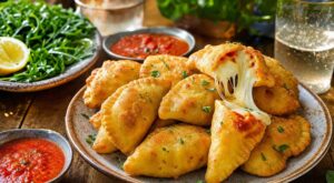 Apéro : arrêtez les pizzas du commerce, ces bouchées italiennes frites à la mozzarella changent tout